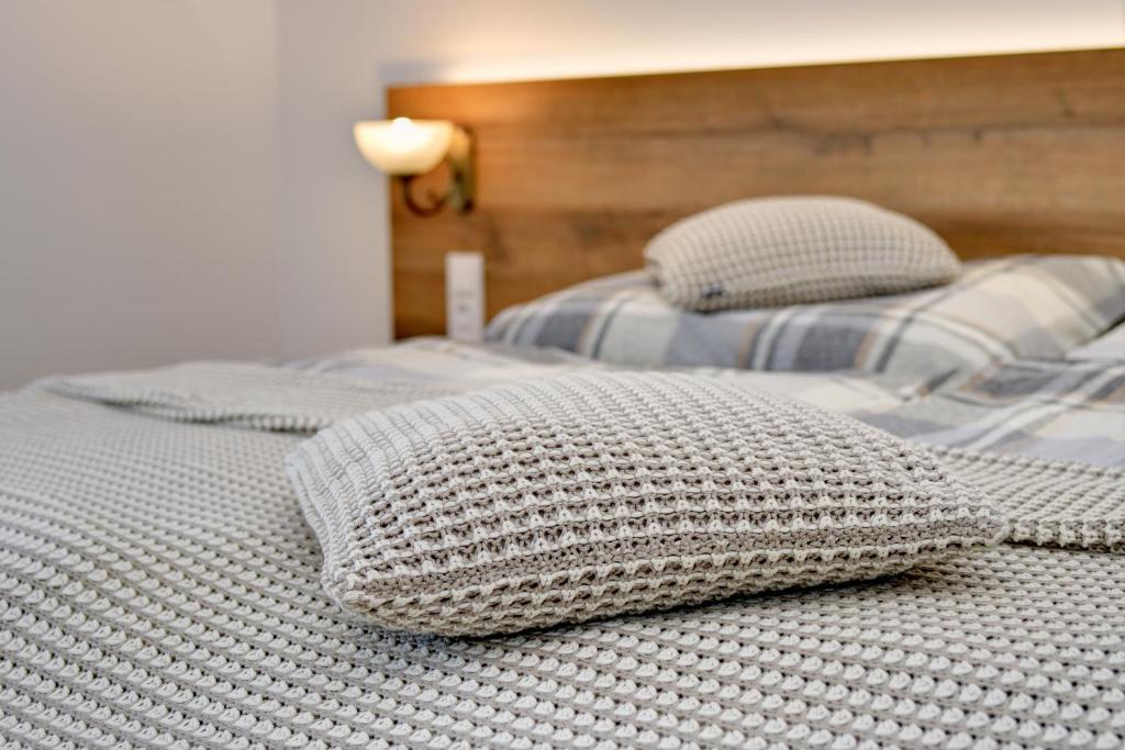 Postel nebo postele na pokoji v ubytování Apartmány Hájovna