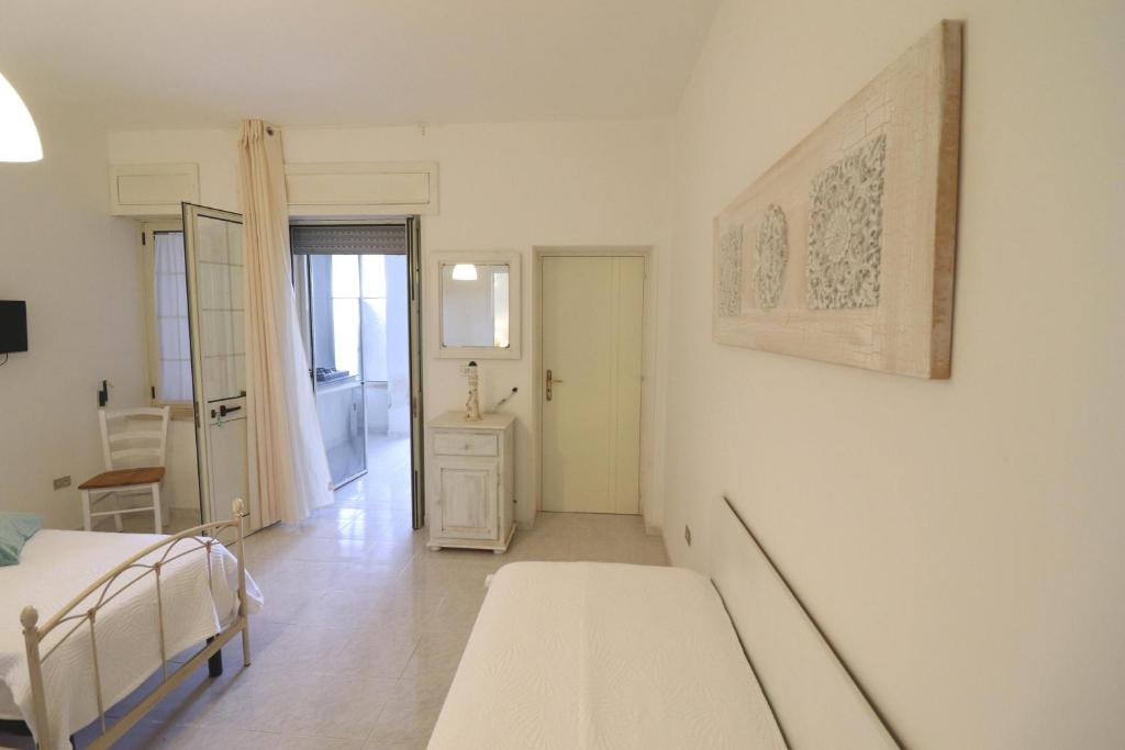 A bed or beds in a room at Casa Cabernet Torre Santo Stefano
