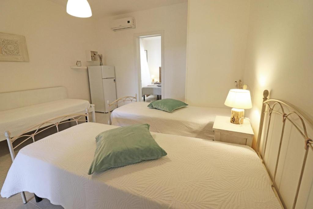 A bed or beds in a room at Casa Cabernet Torre Santo Stefano
