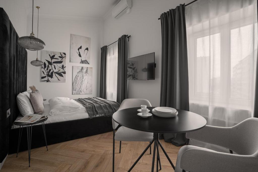 Posteľ alebo postele v izbe v ubytovaní APARTIO ROOMS Katowice