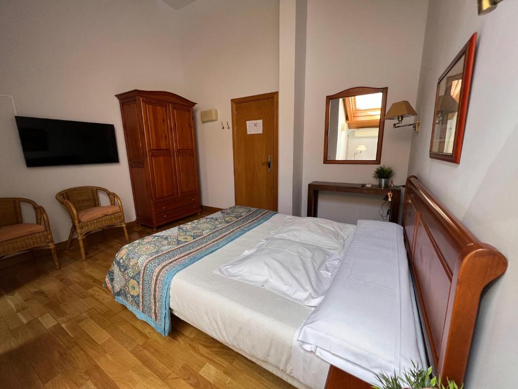 Postel nebo postele na pokoji v ubytování Hostal Rural Salazar