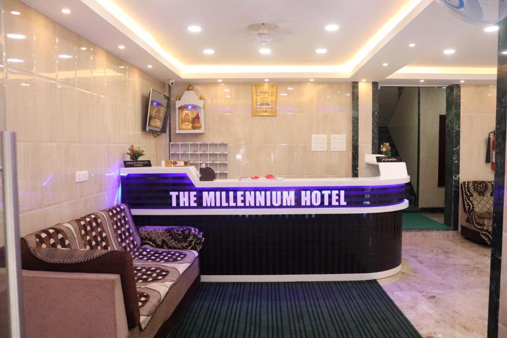 a lobby of a hotel with a reception desk at THE HOTEL MILLENNIUM in Imphal