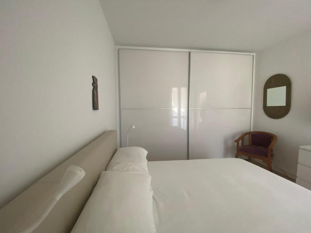 Postel nebo postele na pokoji v ubytování CASA SANDRA
