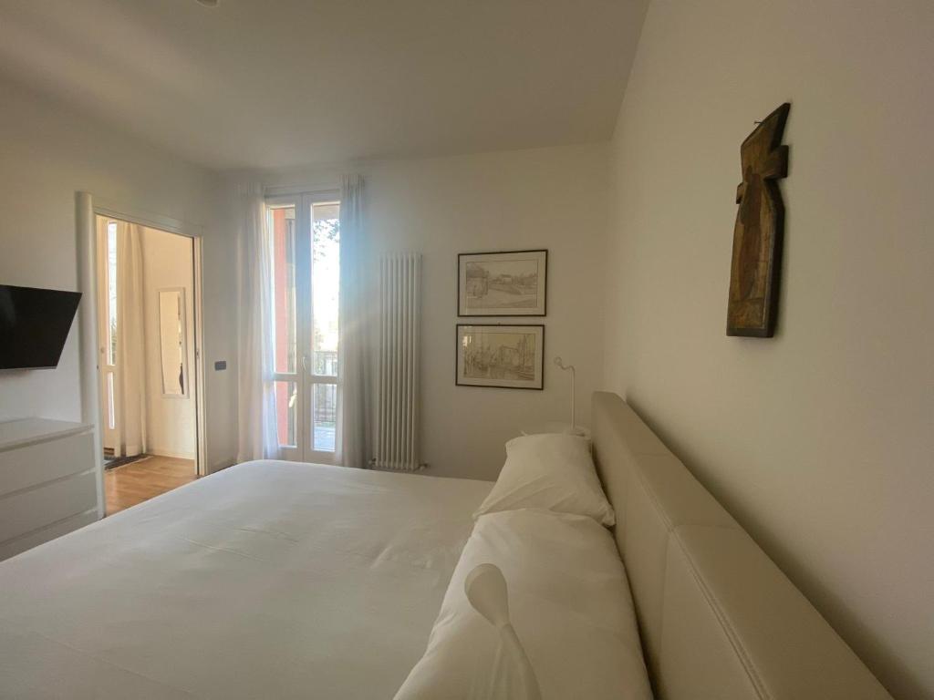 Postel nebo postele na pokoji v ubytování CASA SANDRA