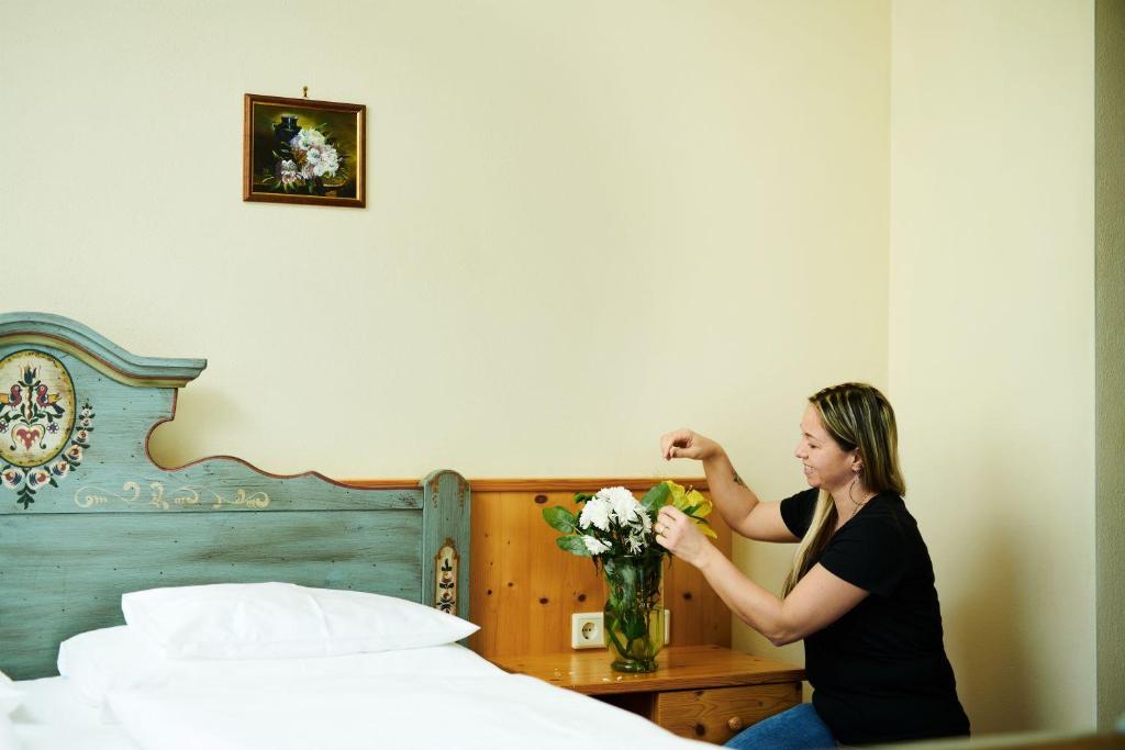 Postel nebo postele na pokoji v ubytování Hotel Garni Thermenoase