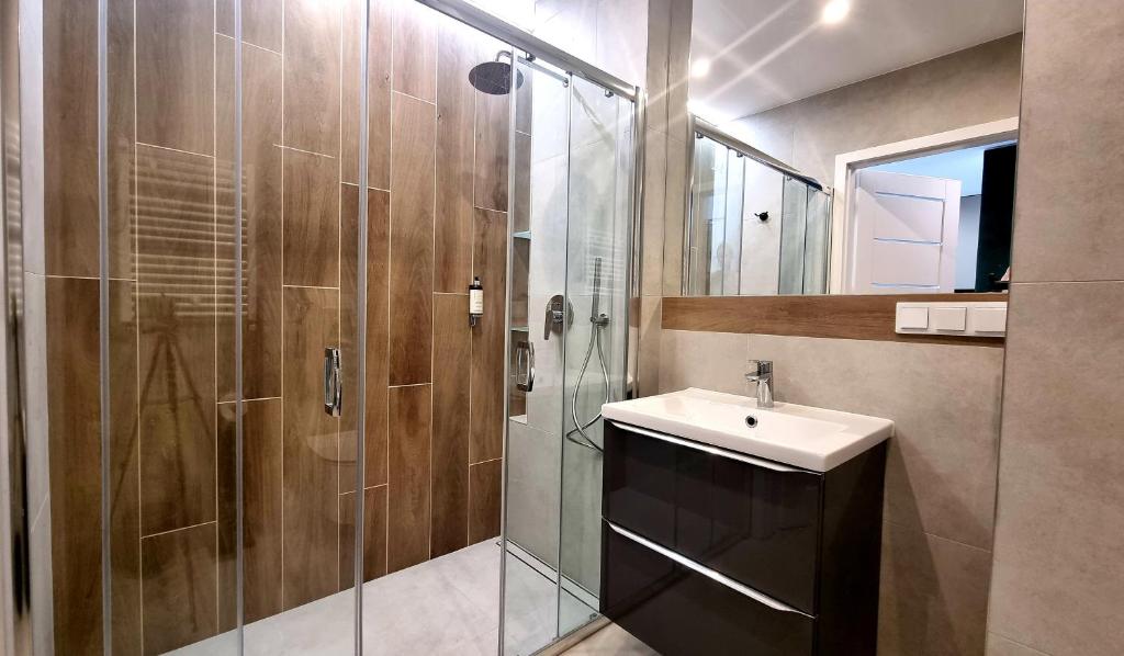 Kúpeľňa v ubytovaní NOOK NOOK Apartments Bytkowska 103