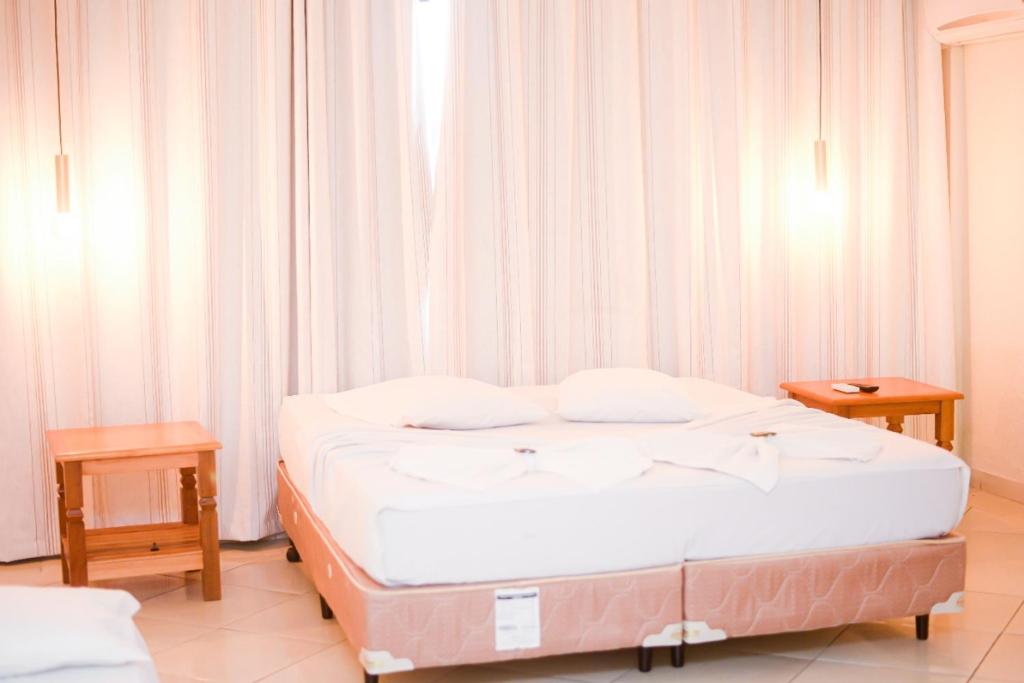 Postel nebo postele na pokoji v ubytování Hotel Luma