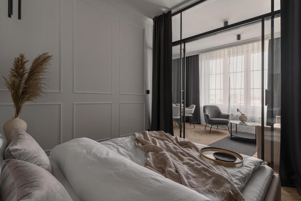 Posteľ alebo postele v izbe v ubytovaní APARTIO ROOMS Katowice