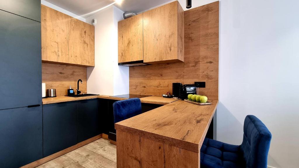 Kuchyňa alebo kuchynka v ubytovaní NOOK NOOK Apartments Bytkowska 103