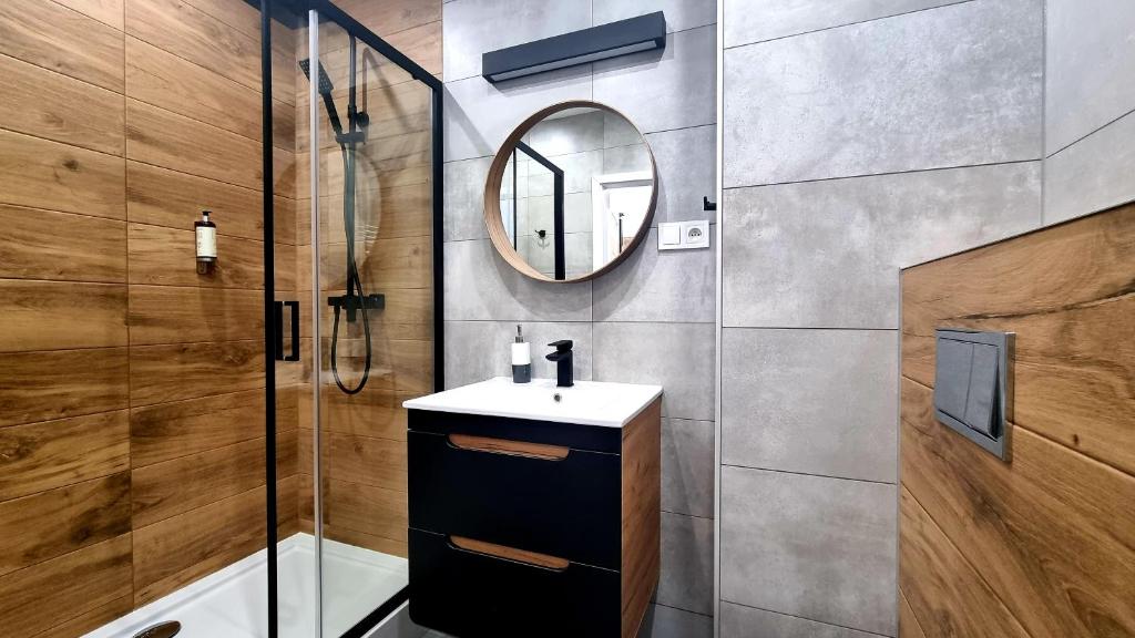 Kúpeľňa v ubytovaní NOOK NOOK Apartments Bytkowska 103