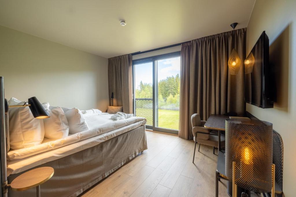 Postel nebo postele na pokoji v ubytování Lily Country Club