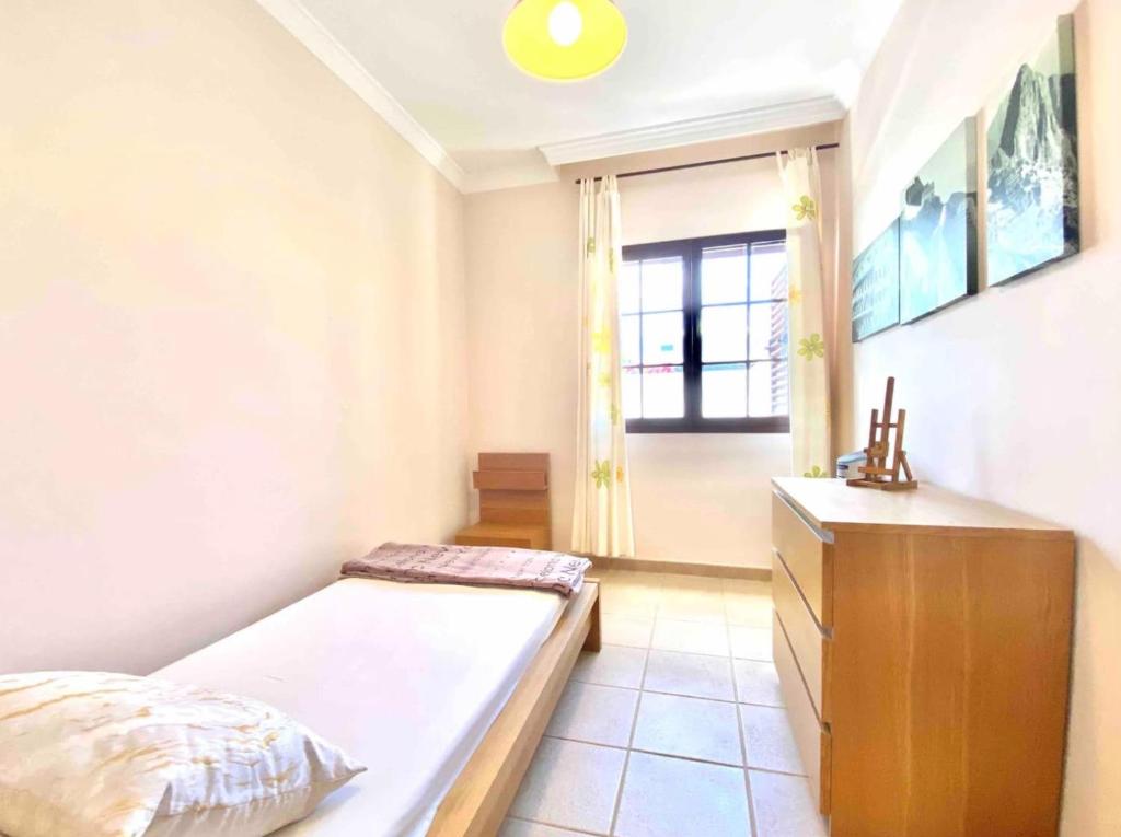 Postel nebo postele na pokoji v ubytování Villa Ágatha, vacaciones en familia en Lanzarote