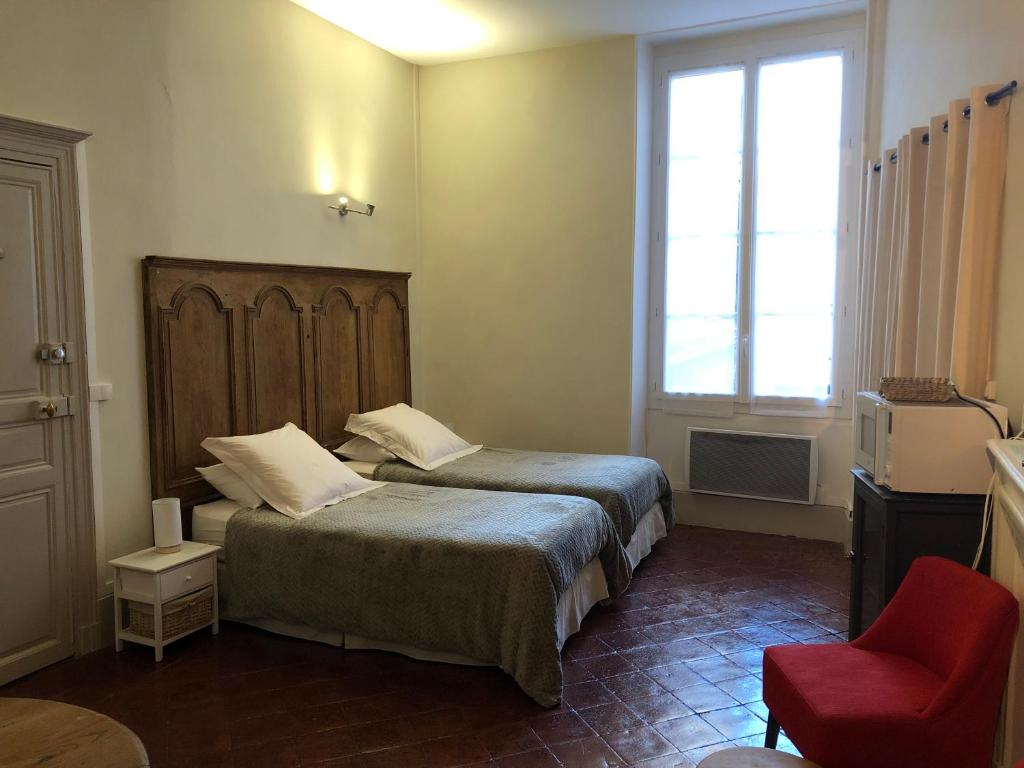Letto o letti in una camera di A2 PAS