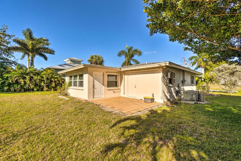 a house with a large yard in front of it at Punta Gorda Home with Backyard about 1 Mile to Dtwn! in Punta Gorda
