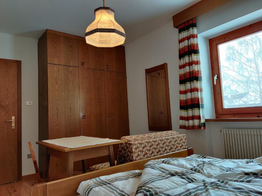 Łóżko lub łóżka w pokoju w obiekcie Lärchenheim
