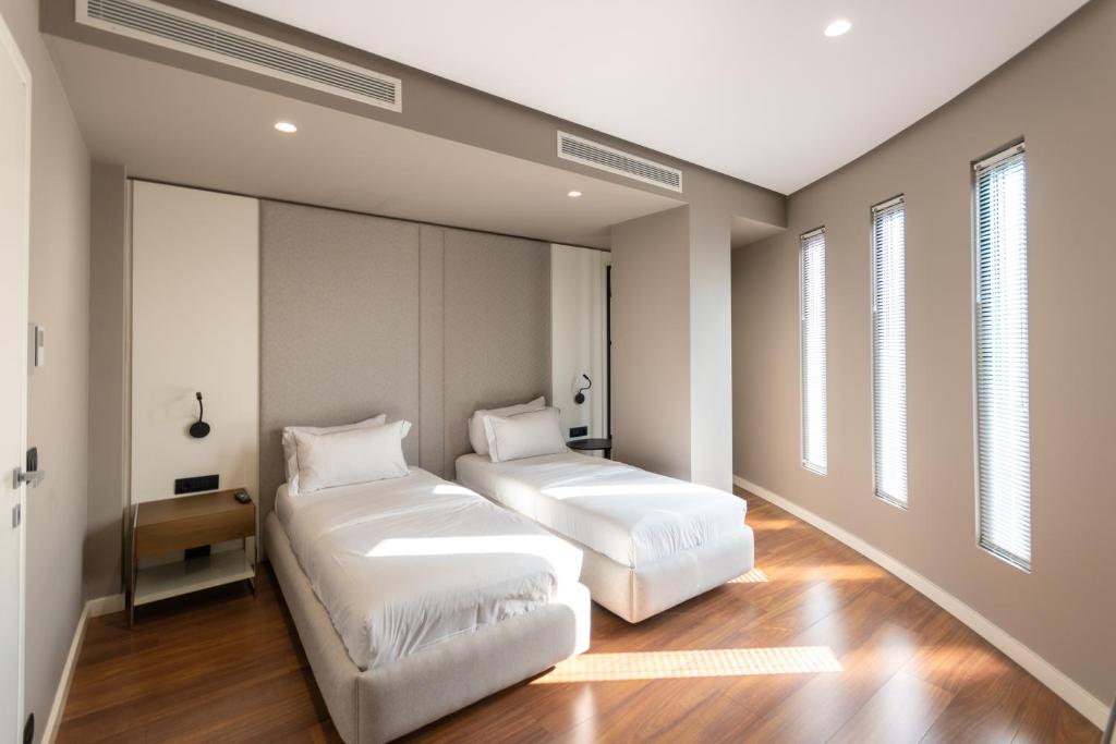 Postel nebo postele na pokoji v ubytování Yacht Hotel