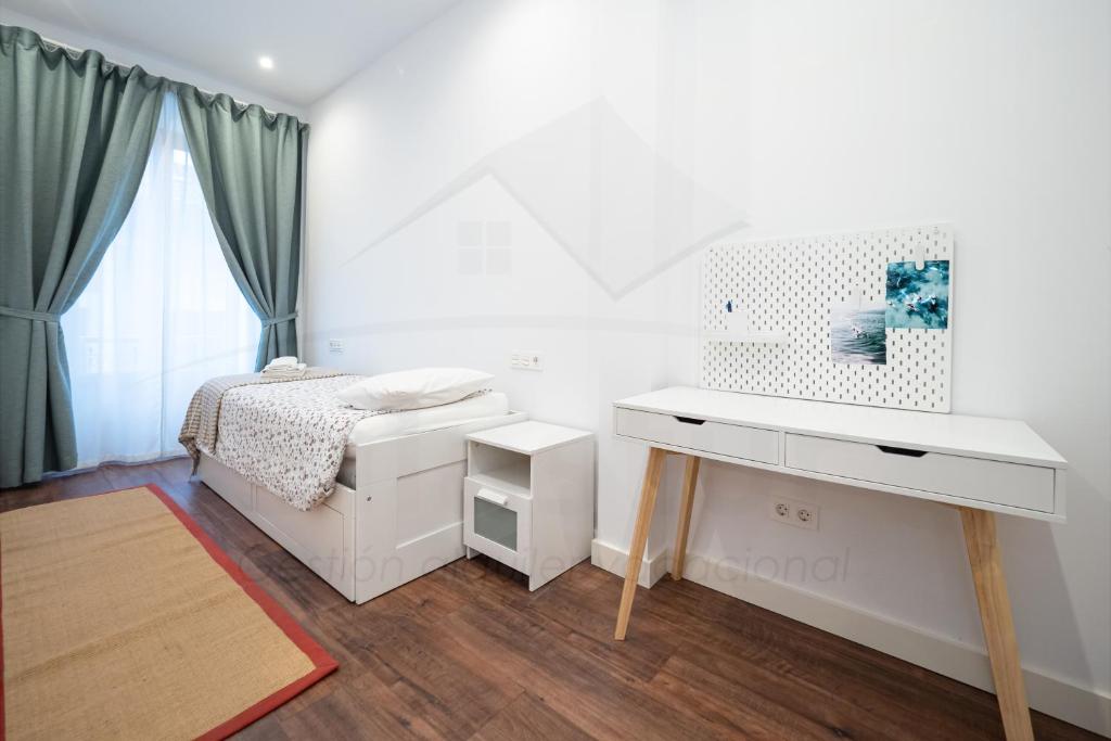 Postel nebo postele na pokoji v ubytování Lavaderu Apartamento