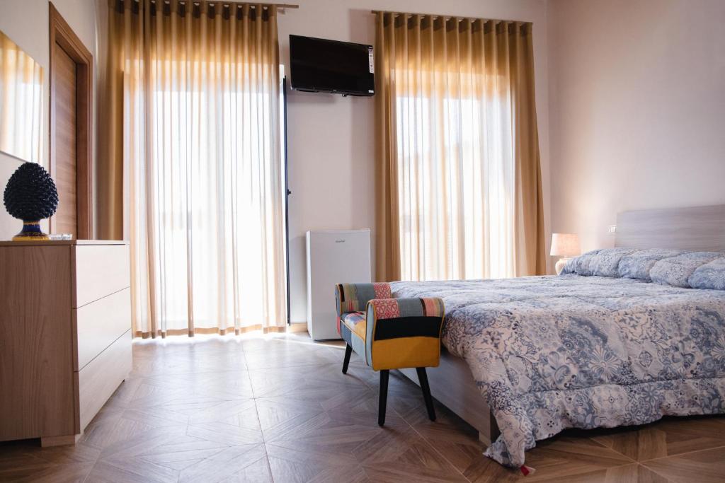 Postel nebo postele na pokoji v ubytování Le Vie di Girgenti