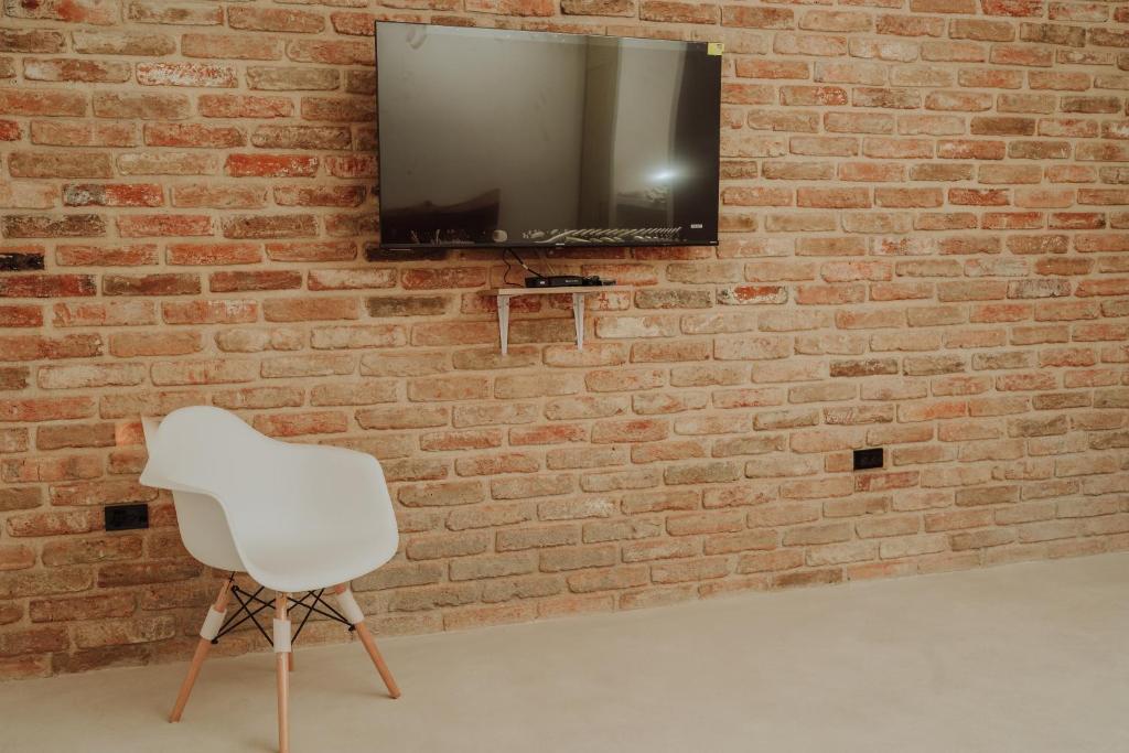 TV a/nebo společenská místnost v ubytování Villas Colón 18