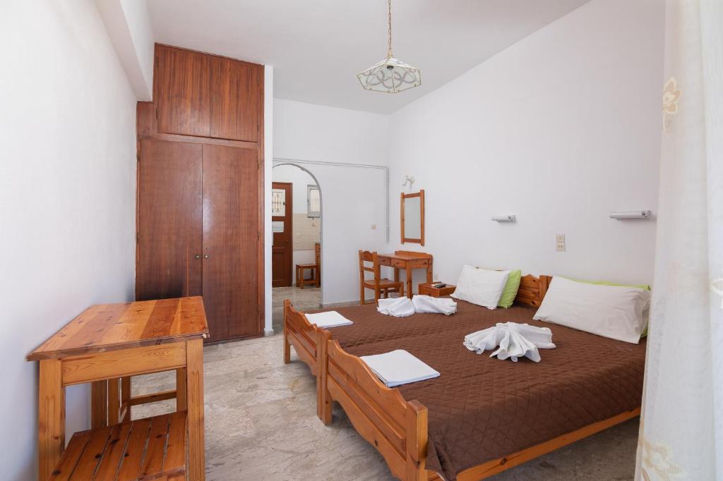 Postel nebo postele na pokoji v ubytování Corfu Star Apartments