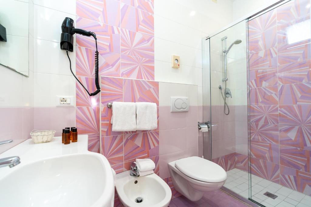 Koupelna v ubytování Hotel Tirsus