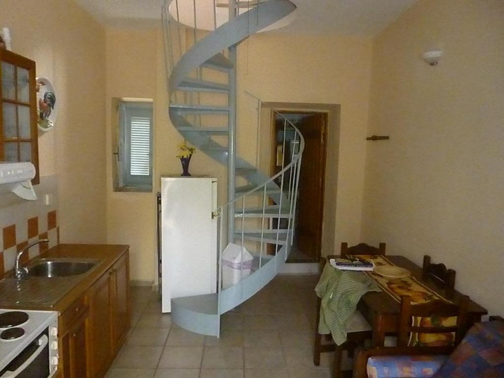 Kuchyň nebo kuchyňský kout v ubytování Katafigio Village