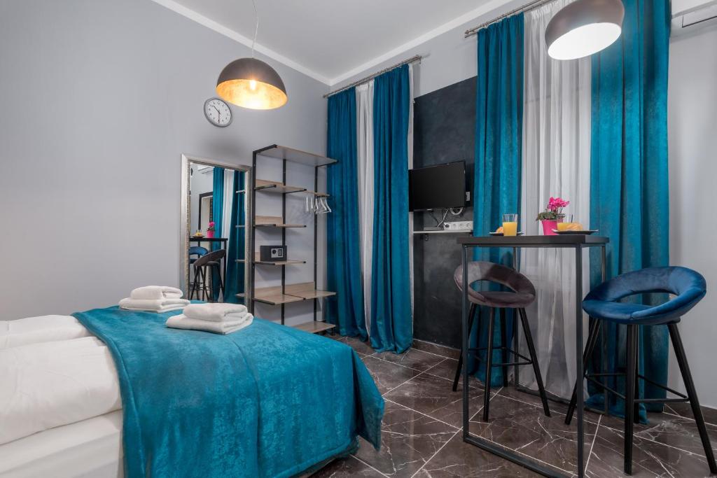 Posteľ alebo postele v izbe v ubytovaní Apartments Piccola Venezia