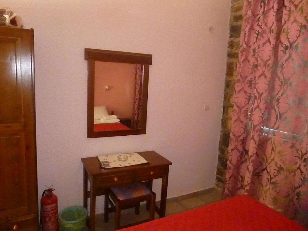 Postel nebo postele na pokoji v ubytování Katafigio Village