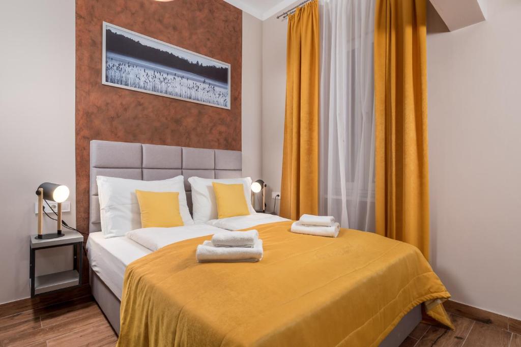 Posteľ alebo postele v izbe v ubytovaní Apartments Piccola Venezia