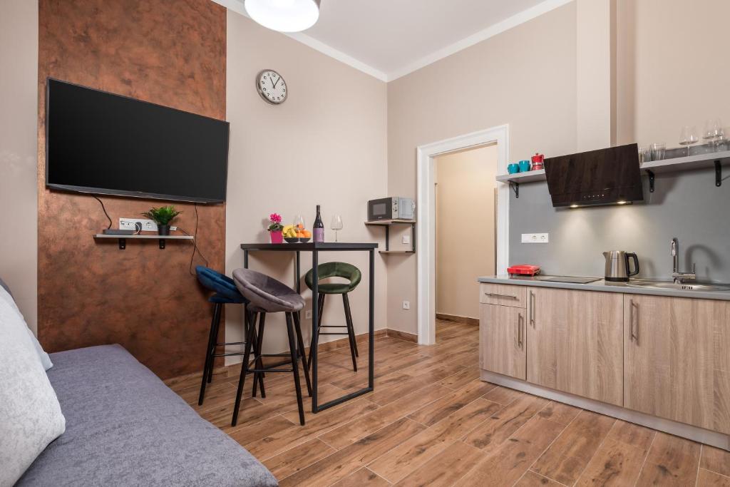 Kuchyňa alebo kuchynka v ubytovaní Apartments Piccola Venezia
