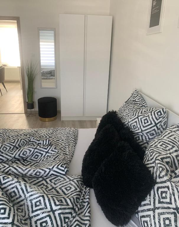 Posteľ alebo postele v izbe v ubytovaní D&V Apartman