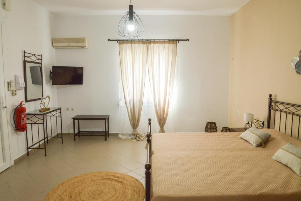 Zdjęcie z galerii obiektu Vichou rooms w mieście Adamas