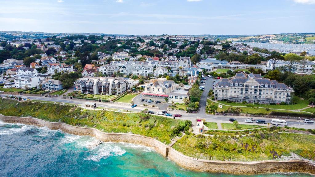 an aerial view of a town on the ocean at Membly Hall Hotel in Falmouth