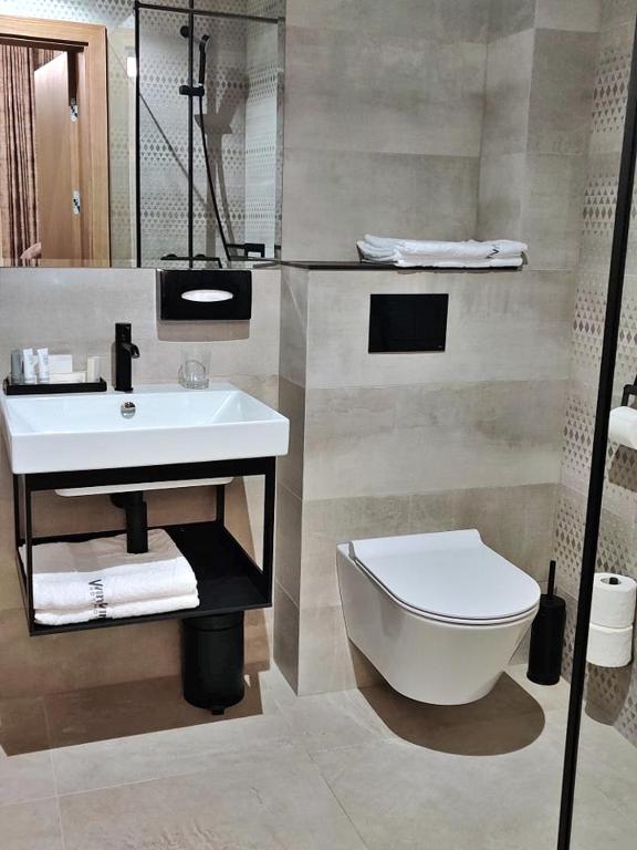Koupelna v ubytování Vvinn Hotel