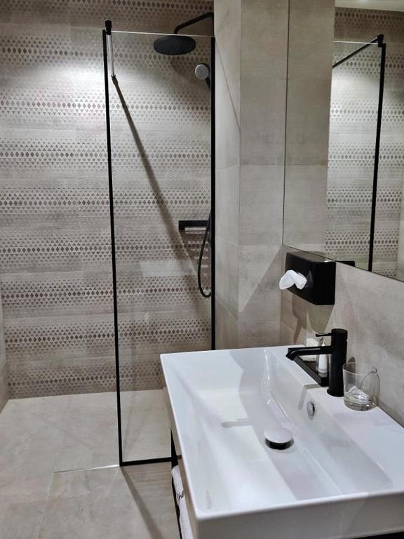 Koupelna v ubytování Vvinn Hotel