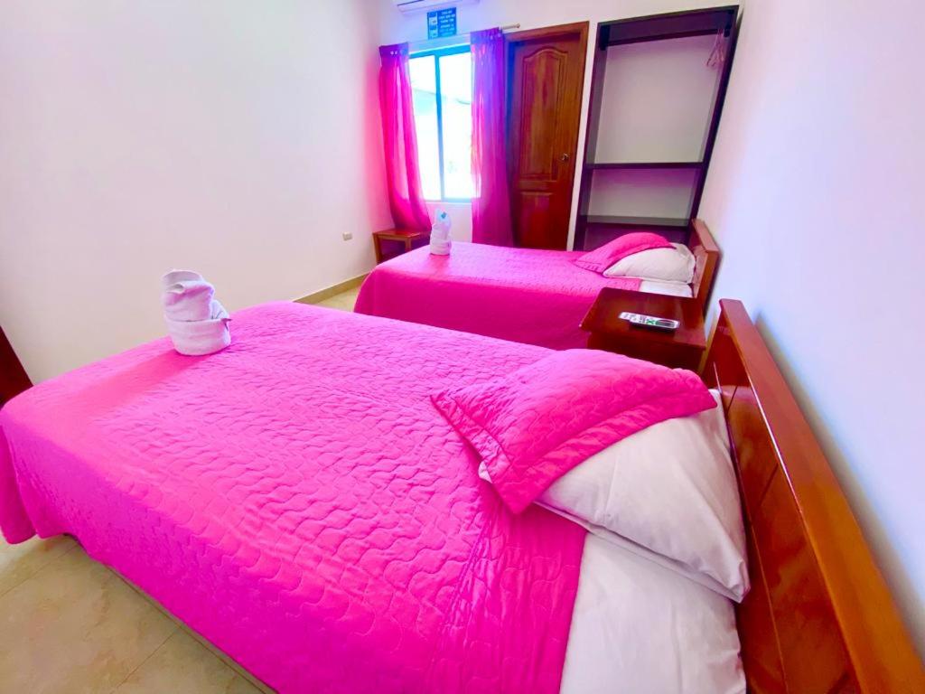 Postel nebo postele na pokoji v ubytování Hostal Punta Arena