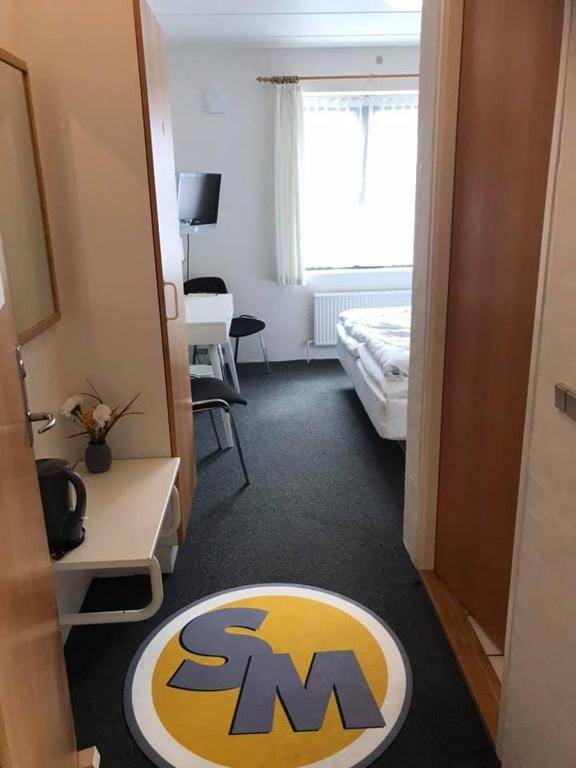 Postel nebo postele na pokoji v ubytování Roslev Hus