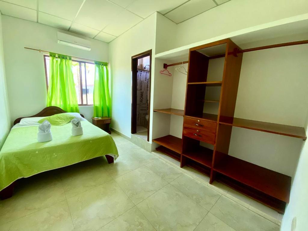 Postel nebo postele na pokoji v ubytování Hostal Punta Arena