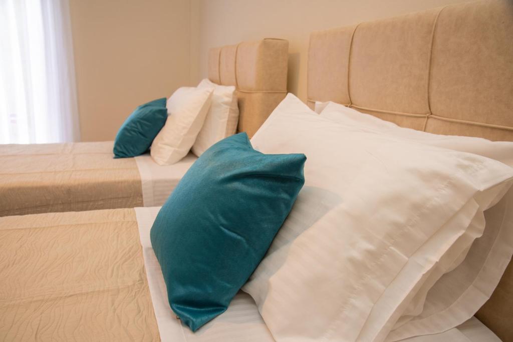 A bed or beds in a room at Eleonas Holiday Home Apartment