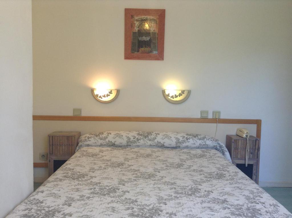Postel nebo postele na pokoji v ubytování Hotel Acapulco