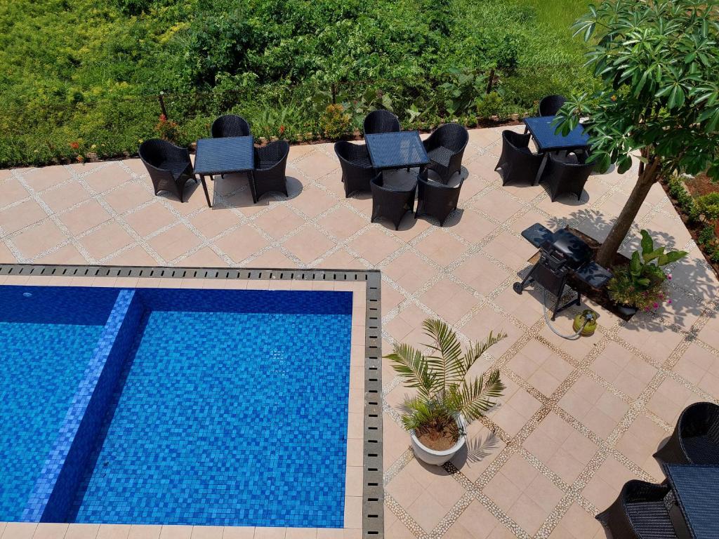 Bazén v ubytování Garden House Jepara nebo v jeho okolí