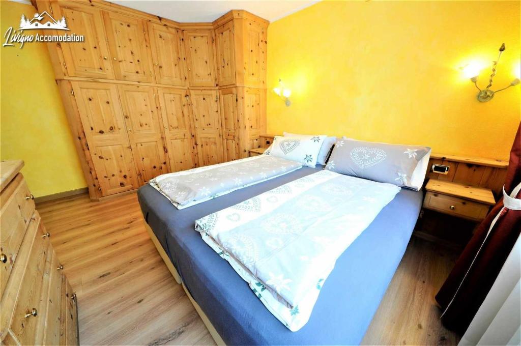 Posteľ alebo postele v izbe v ubytovaní Alpen Royal by Livigno Accomodation