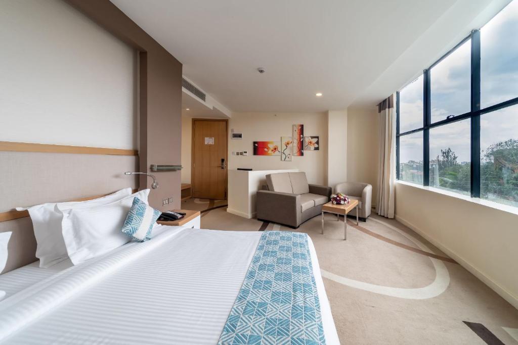 Postel nebo postele na pokoji v ubytování PrideInn Azure Hotel Nairobi Westlands