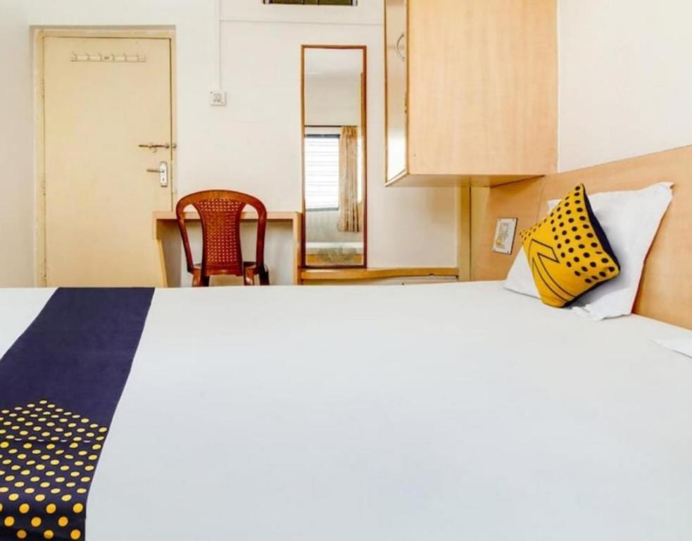 Postel nebo postele na pokoji v ubytování Hotel Rahi