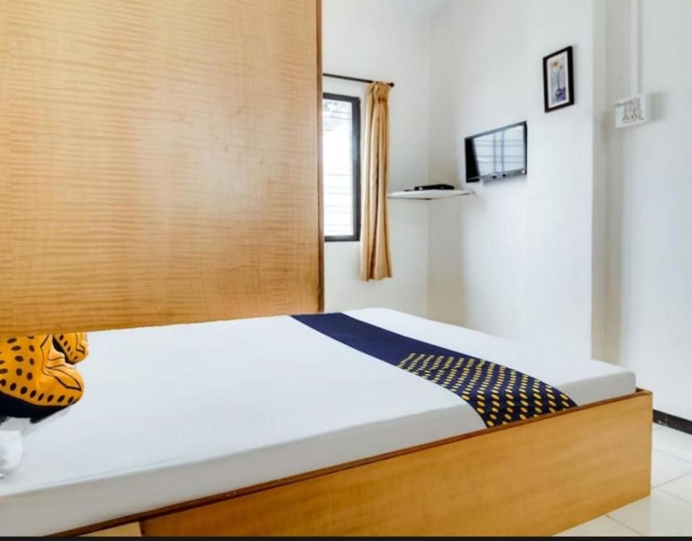 Postel nebo postele na pokoji v ubytování Hotel Rahi
