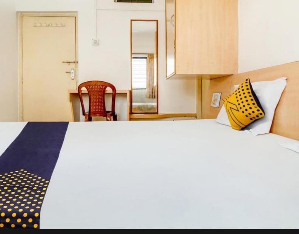 Postel nebo postele na pokoji v ubytování Hotel Rahi