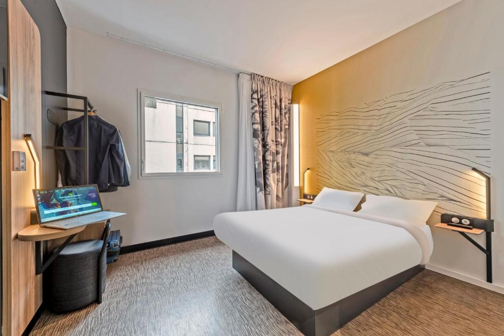 Postel nebo postele na pokoji v ubytování B&B HOTEL Brest Centre Port de Commerce