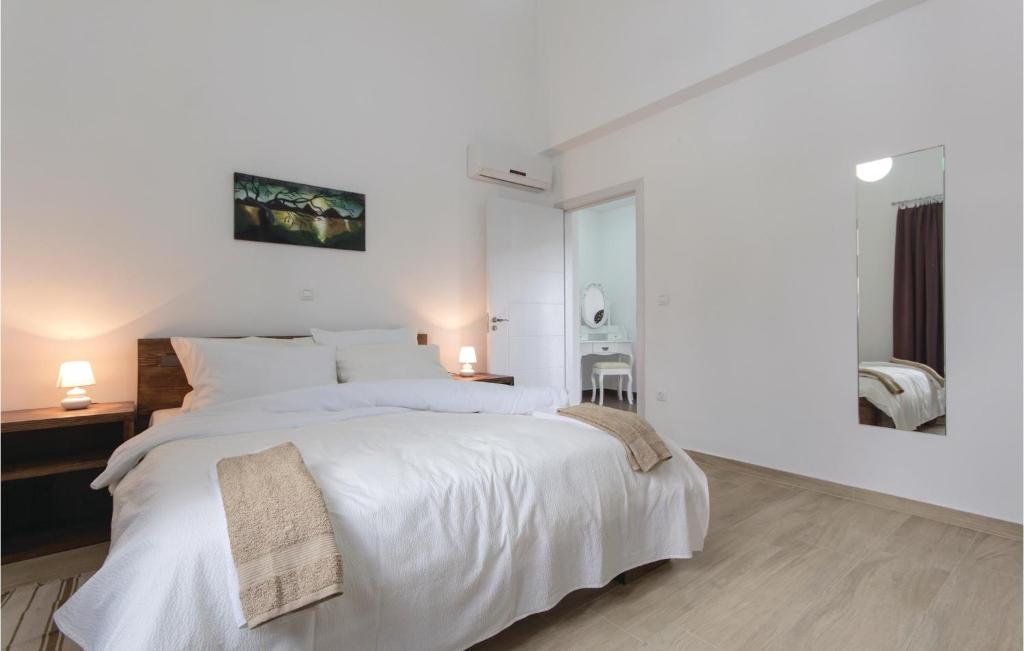 Łóżko lub łóżka w pokoju w obiekcie Holiday Home Marcana 57
