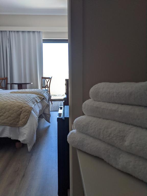 Postel nebo postele na pokoji v ubytování LEPANTO BEACH HOTEL