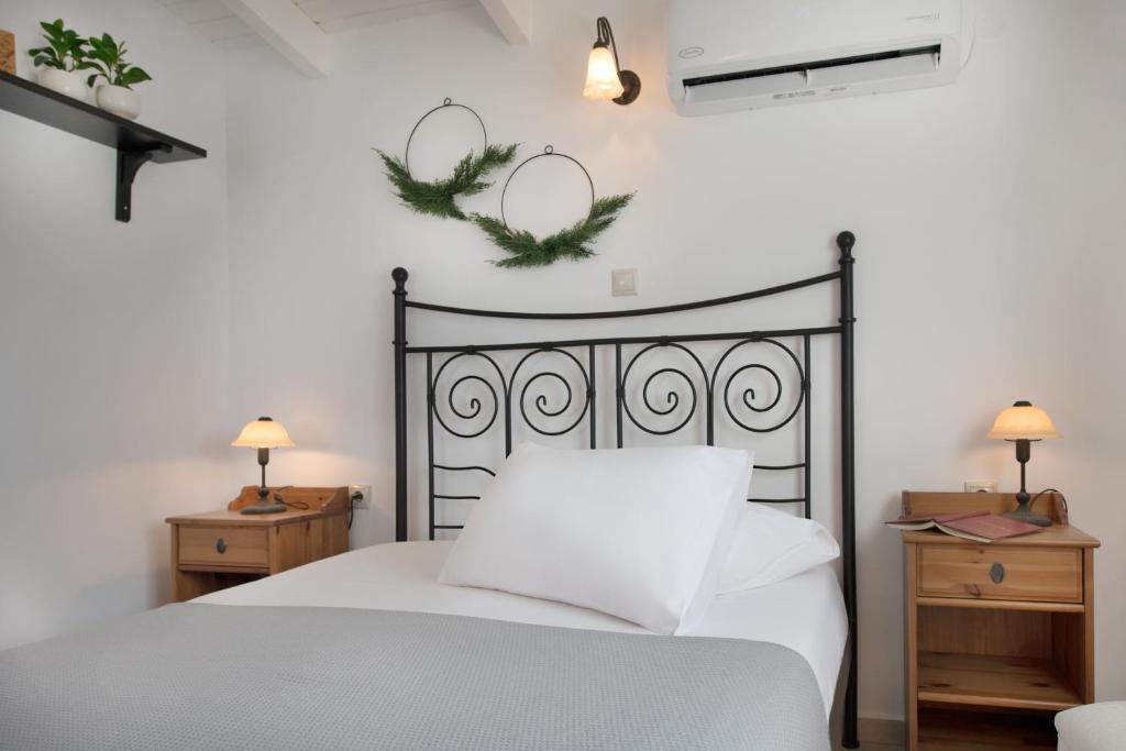 Łóżko lub łóżka w pokoju w obiekcie Dream House Efi